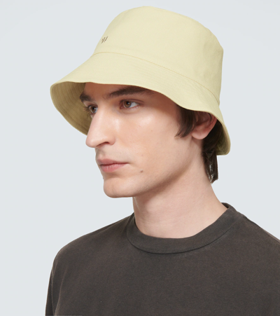 Shop Nanushka Cotton Bucket Hat In Creme