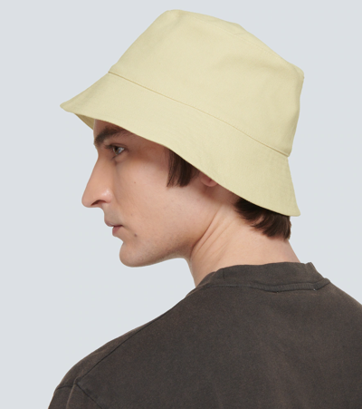 Shop Nanushka Cotton Bucket Hat In Creme