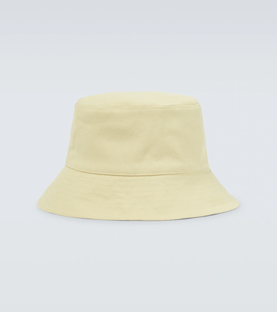 Shop Nanushka Cotton Bucket Hat In Creme