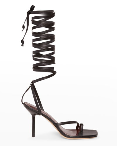 Shop Staud Nicola Leather Ankle-wrap Gladiator Sandals In Black
