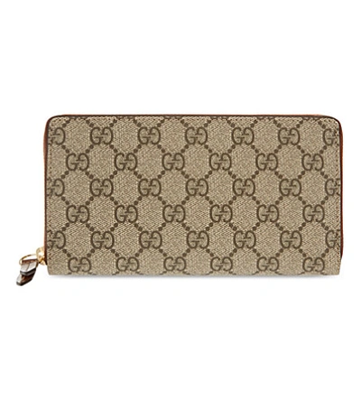 Shop Gucci Gg Logo Printed Leather Purse In Beige Ebony