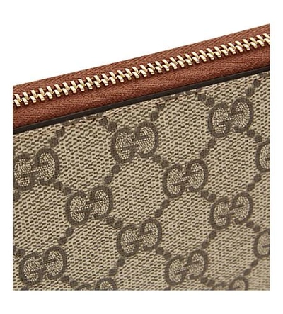 Shop Gucci Gg Logo Printed Leather Purse In Beige Ebony