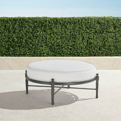 FRONTGATE CARLISLE ROUND OTTOMAN WITH CUSHION IN SLATE ALUMINUM 