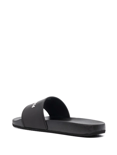 Shop Axel Arigato Logo-print Slides In Schwarz