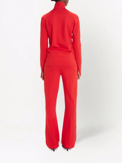 Shop Jw Anderson Kick-flare Track Pants In Red