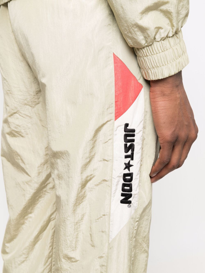 Shop Just Don Stripe-side Tech Track Pants In Nude