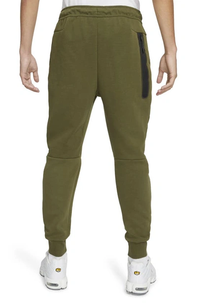 Shop Nike Tech Fleece Jogger Sweatpants In Rough Green/ Black
