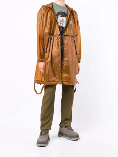 Undercover Convertible Packable Logo-print Nylon-ripstop Hooded Jacket In Braun