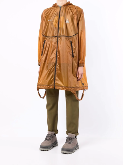 Undercover Convertible Packable Logo-print Nylon-ripstop Hooded Jacket In Braun