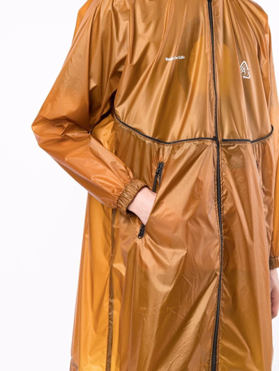 Undercover Convertible Packable Logo-print Nylon-ripstop Hooded Jacket In Braun