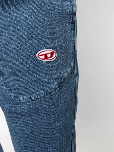 Shop Diesel D-martians Track 09c99 Wide-leg Jeans In Blue