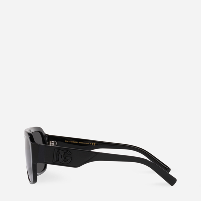 Shop Dolce & Gabbana Dg Crossed Sunglasses In Black