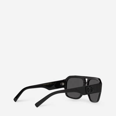 Shop Dolce & Gabbana Dg Crossed Sunglasses In Black