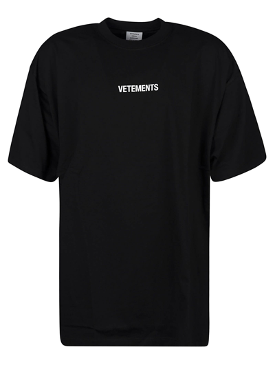 Shop Vetements Logo Label T-shirt In Black/white
