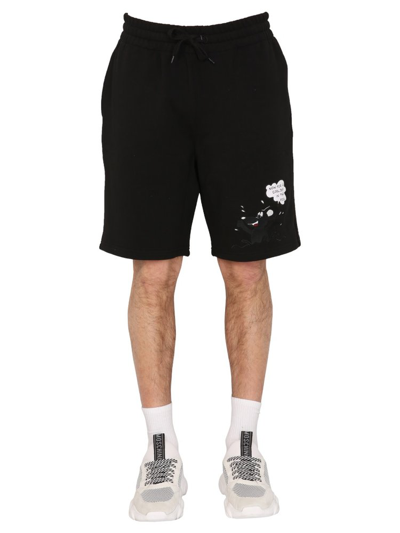 Shop Moschino Printed Bermuda Shorts In Black