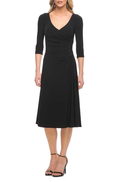 Shop La Femme Ruched Jersey Faux Wrap Dress In Black