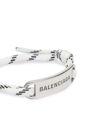 Shop Balenciaga Logo-engraved Plate Cord Bracelet In Silber