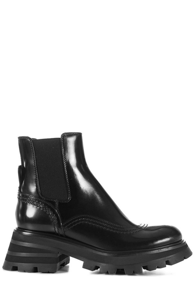 Shop Alexander Mcqueen Wander Chelsea Round Toe Boots In Black