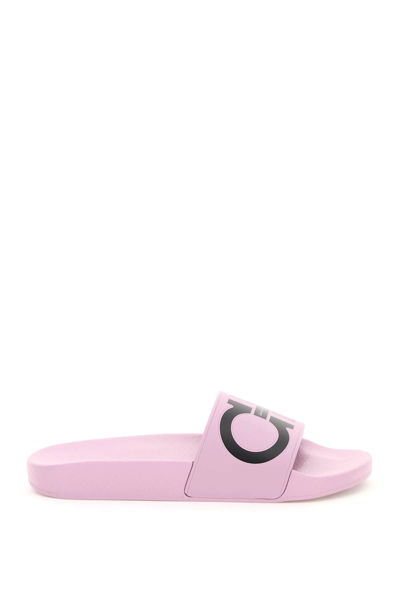 Shop Ferragamo Groovy Slippers With Logo In Pink,black
