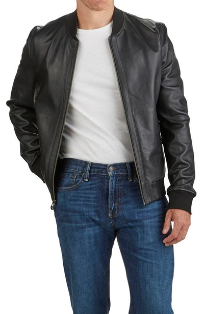 Shop Cole Haan Bonded Leather Bomber Jacket In Black