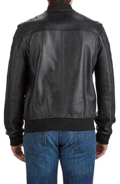 Shop Cole Haan Bonded Leather Bomber Jacket In Black