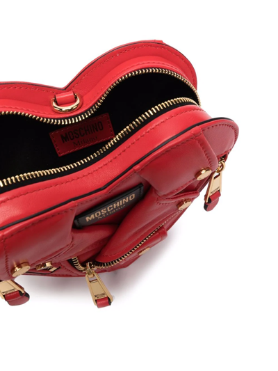 Shop Moschino Heart-shape Moto Shoulder Bag In Rot