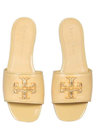 Shop Tory Burch Eleanor Slide Sandals In Yellow