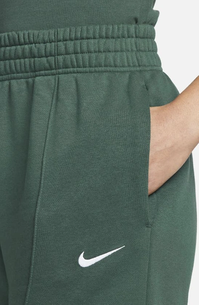Shop Nike Sportswear Essential Fleece Pants In Pro Green/ White