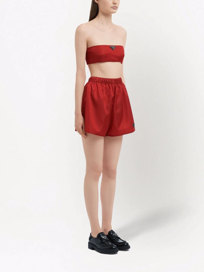 Shop Prada Re-nylon Elasticated Shorts In Red