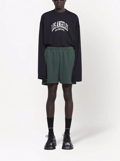 Shop Balenciaga Los Angeles Track Shorts In Dark Green/white