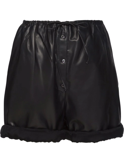 Shop Prada High-waisted Leather Shorts In Black