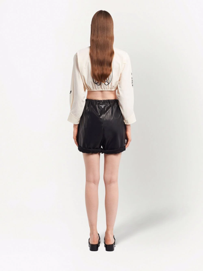 Shop Prada High-waisted Leather Shorts In Black