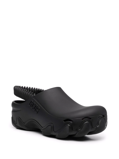 Shop Gcds Embossed-logo Slingback Clogs In Schwarz