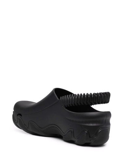 Shop Gcds Embossed-logo Slingback Clogs In Schwarz