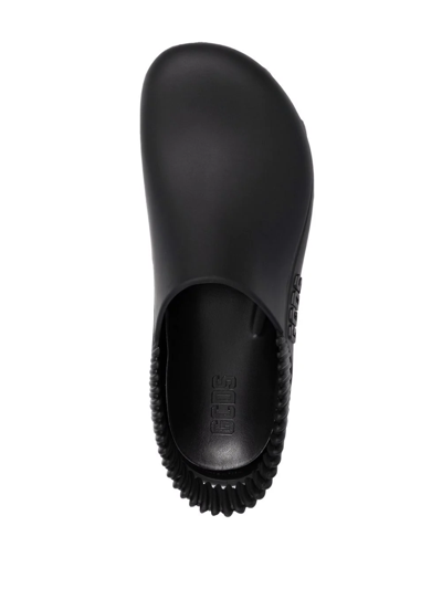 Shop Gcds Embossed-logo Slingback Clogs In Schwarz