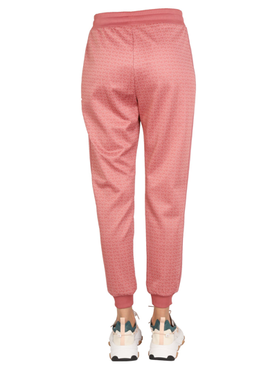 Shop Michael Michael Kors Monogram Logo Jogging Pants In Rosa