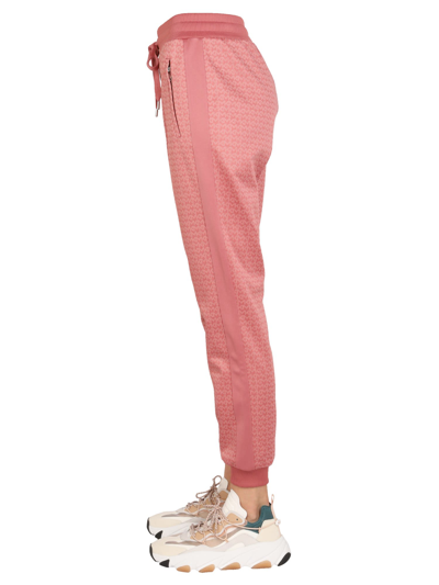 Shop Michael Michael Kors Monogram Logo Jogging Pants In Rosa