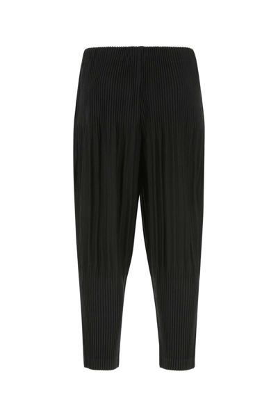 Shop Issey Miyake Pleated Tapered Leg Pants In 15