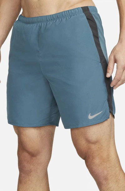 Shop Nike Dri-fit Challenger 2-in-1 Running Shorts In Ash Green/ Dark Smoke Grey