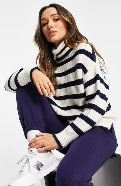 Shop Topshop Stripe Turtleneck Sweater In Ivory/navy