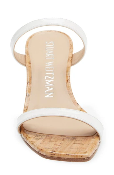 Shop Stuart Weitzman Aleena Wedge Slide Sandal In White