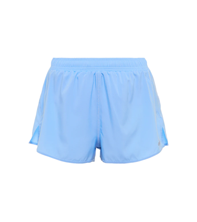 Shop Alo Yoga Stride Shorts In Tile Blue