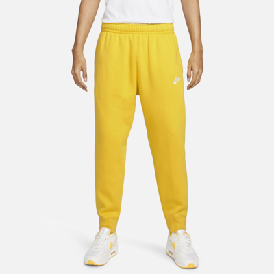 Shop Nike Sportswear Club Fleece Joggers In Vivid Sulfur,vivid Sulfur,white