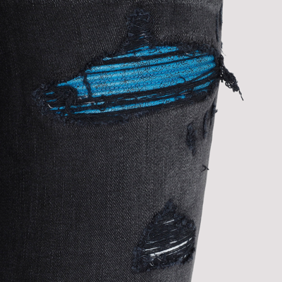 Shop Amiri Mx1 Cracked Paint Jeans In Black