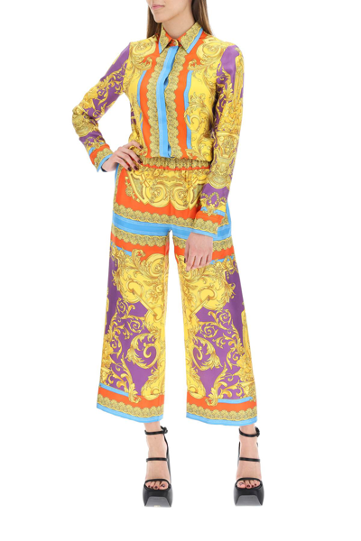 Shop Versace Barocco Goddess Silk Trousers In Orange,gold,blue