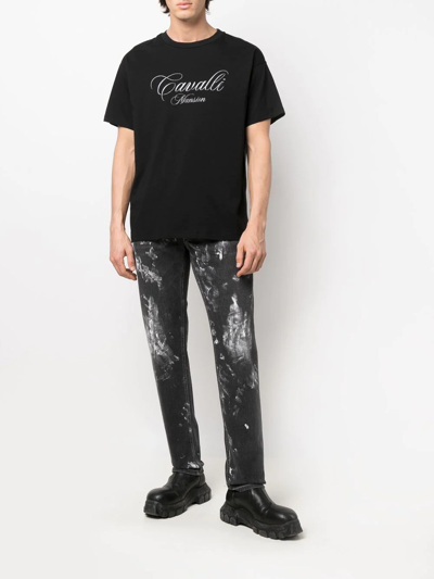 Shop Roberto Cavalli Logo-print Distressed Straight-leg Jeans In Black