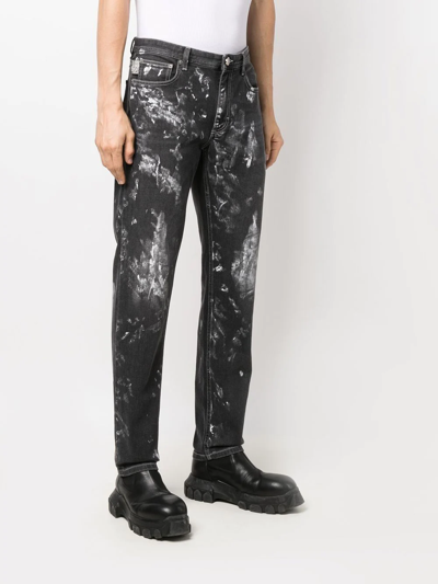 Shop Roberto Cavalli Logo-print Distressed Straight-leg Jeans In Black