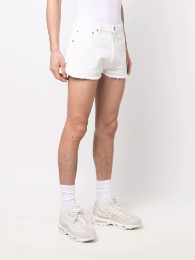 Shop Erl Raw-cut Denim Shorts In Weiss