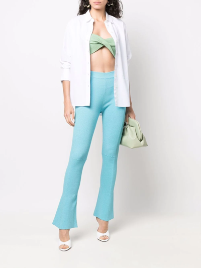 Shop Jacquemus Stretch Bootcut Trousers In Blue