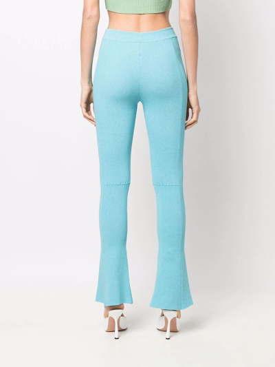 Shop Jacquemus Stretch Bootcut Trousers In Blue